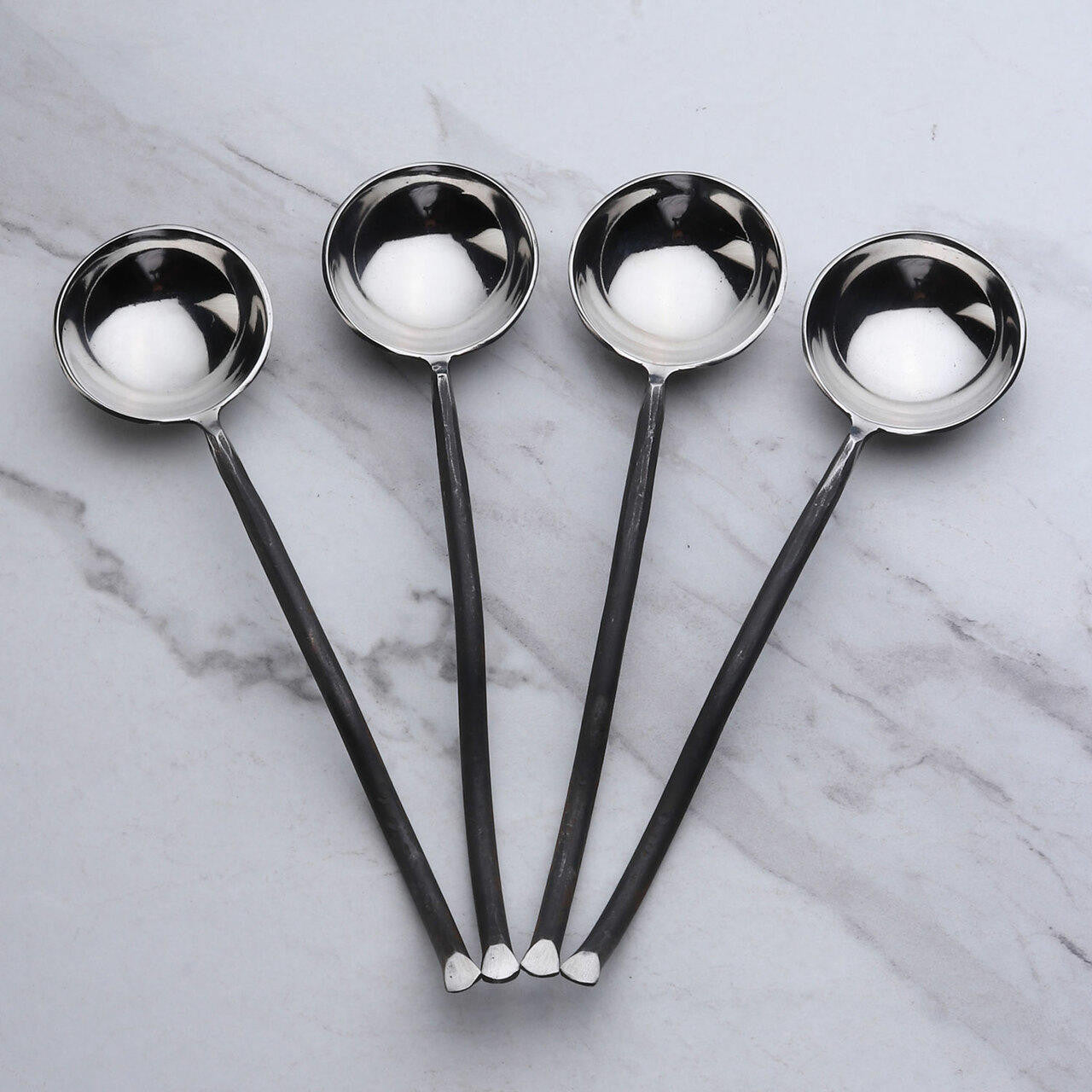 http://inoxflatware.com/cdn/shop/products/twig-sugar-spoon-4-pc-set__00776.1653632566.1280.1280.jpg?v=1692249391