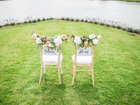 Two wedding chairs labeled Forever and Always